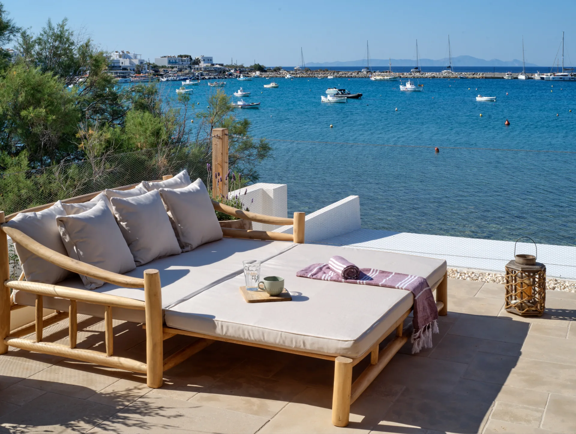 Balcony lounge bed overlooking the bay