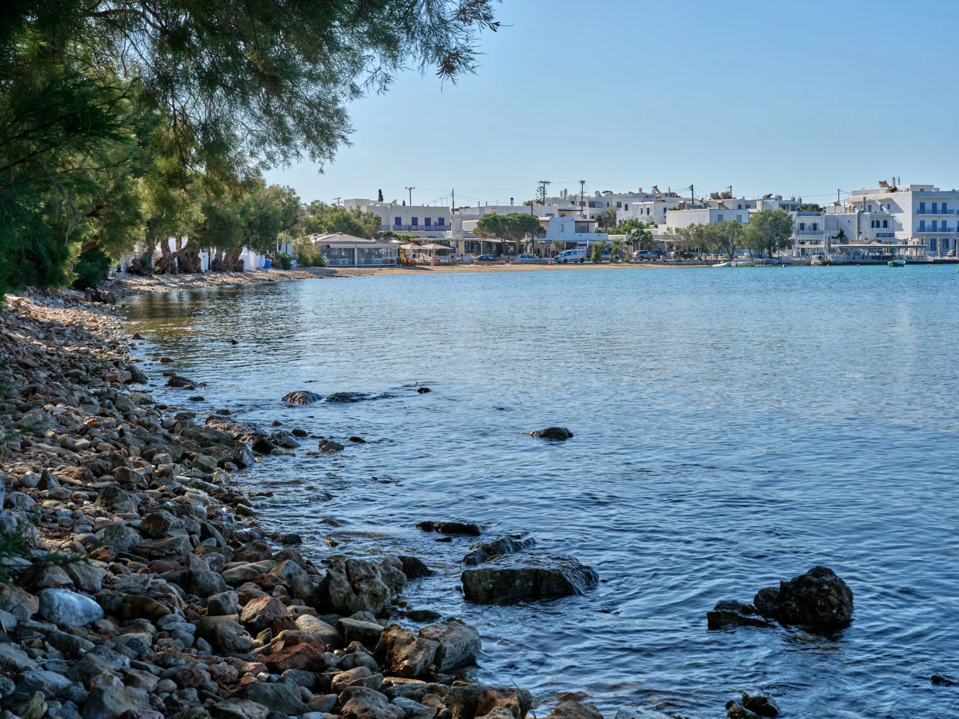 Rocky shoreline across Aliki bay