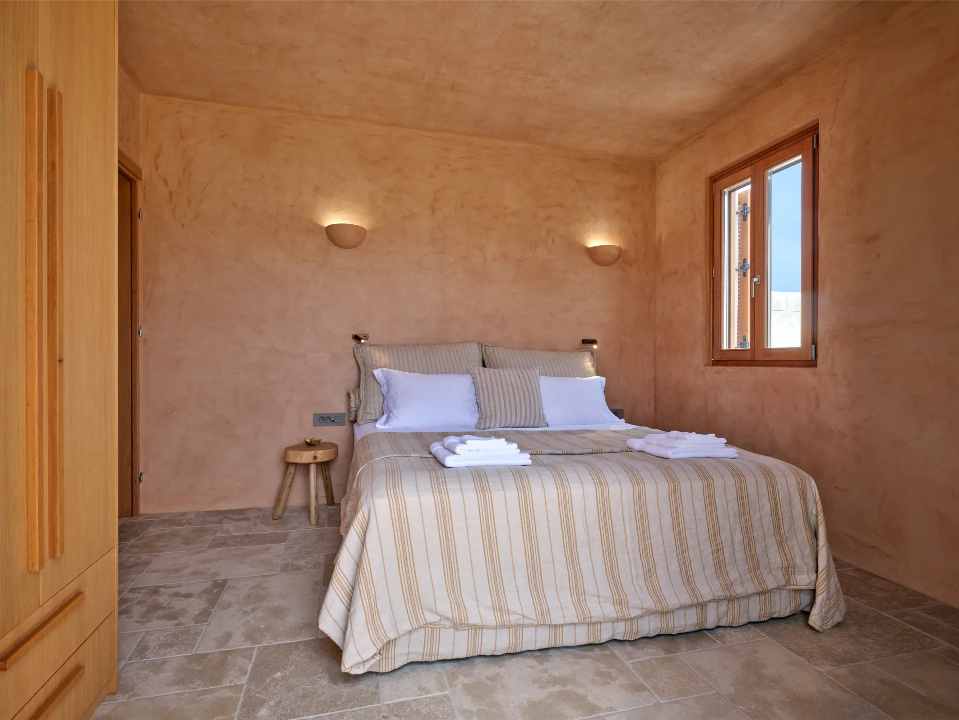 Bedroom bed with wall reading lights